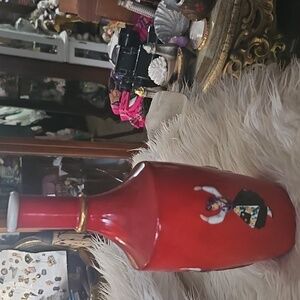 Elegant Red Vase with Dancing Figure